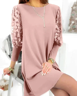 Plain dress with puff sleeves and round neck